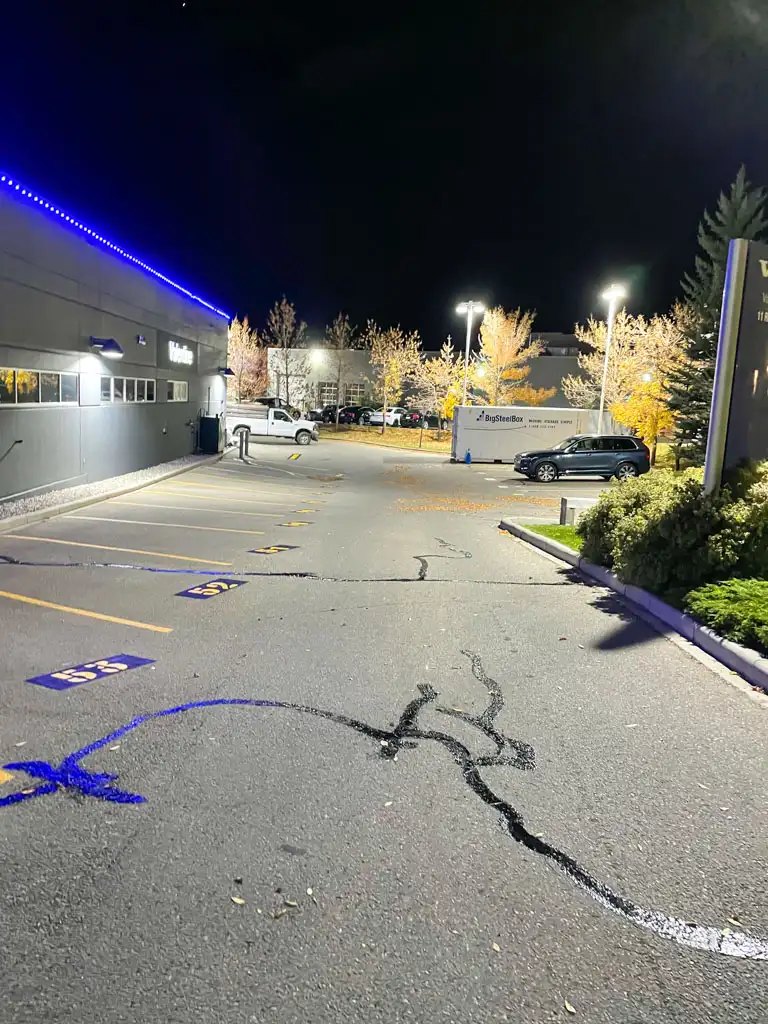 Asphalt parking lot crack filling and crack sealing